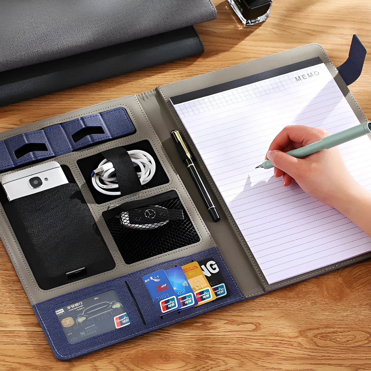 Leather A4 business folder in black, 325x250mm, with notepad and pen slots