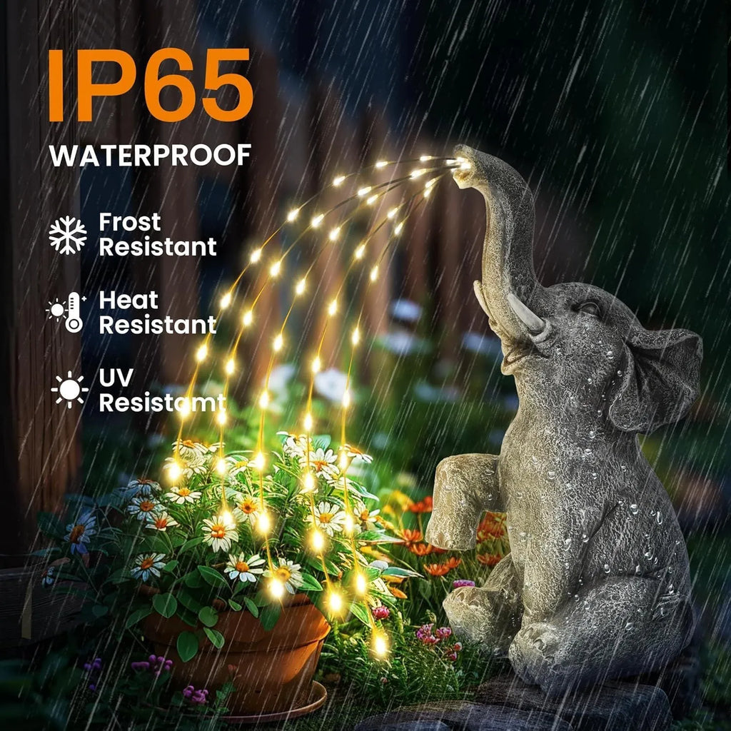 Outdoor garden elephant statue made from resin with integrated LED light strip.