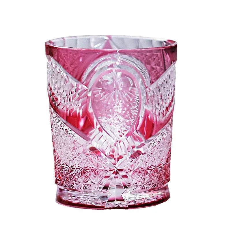 Crystal glass hand carved golden red owl wine glass with 201-300ml capacity on a table