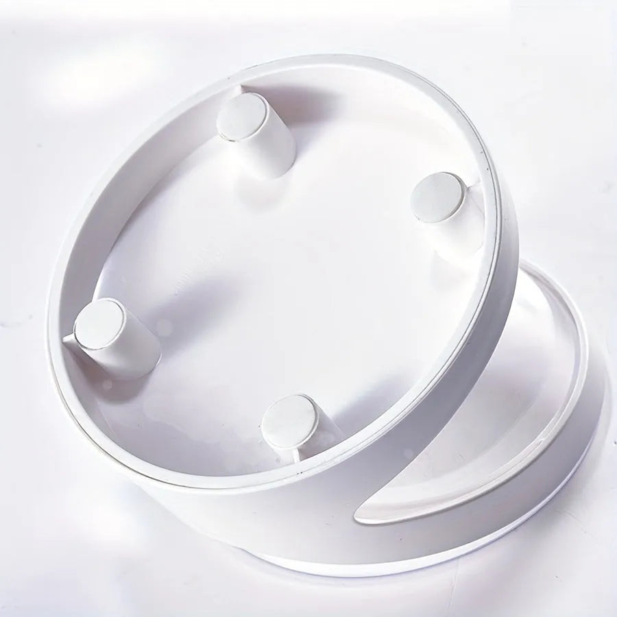 White elevated clear plastic cat food bowl with a tilted feeding surface for neck support.
