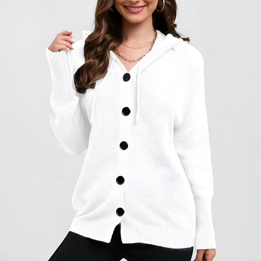 Women's loose-fit hooded cardigan in thick coloured cotton, shown in a solid colour with long sleeves.