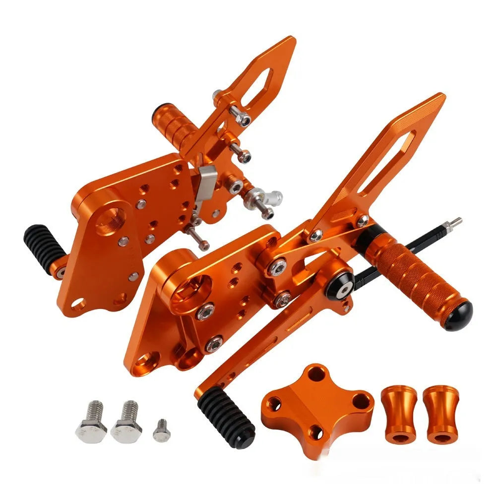 KTM Duke motorcycle black and orange foot pedal support assembly modification kit