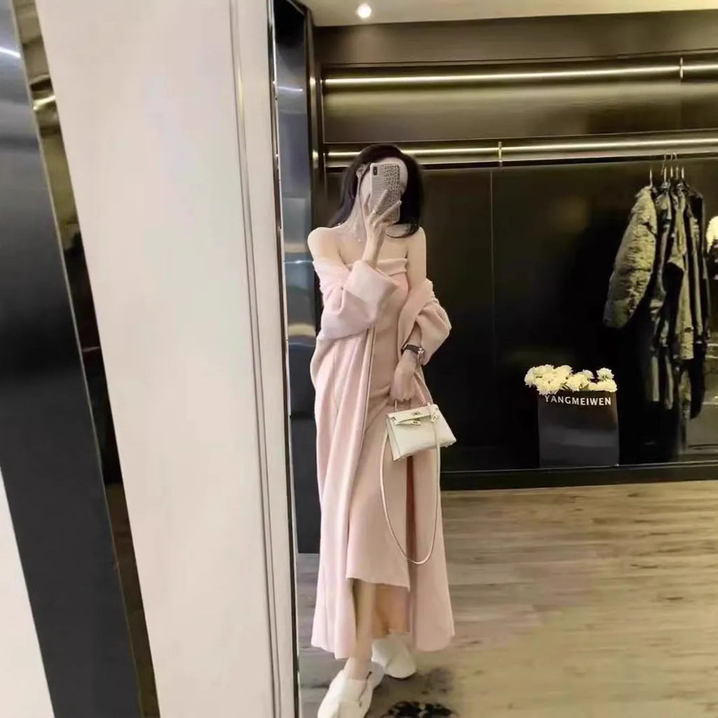 Women's grey knitted long sleeve cardigan and dress co-ord set with flocking detail on a hanger.