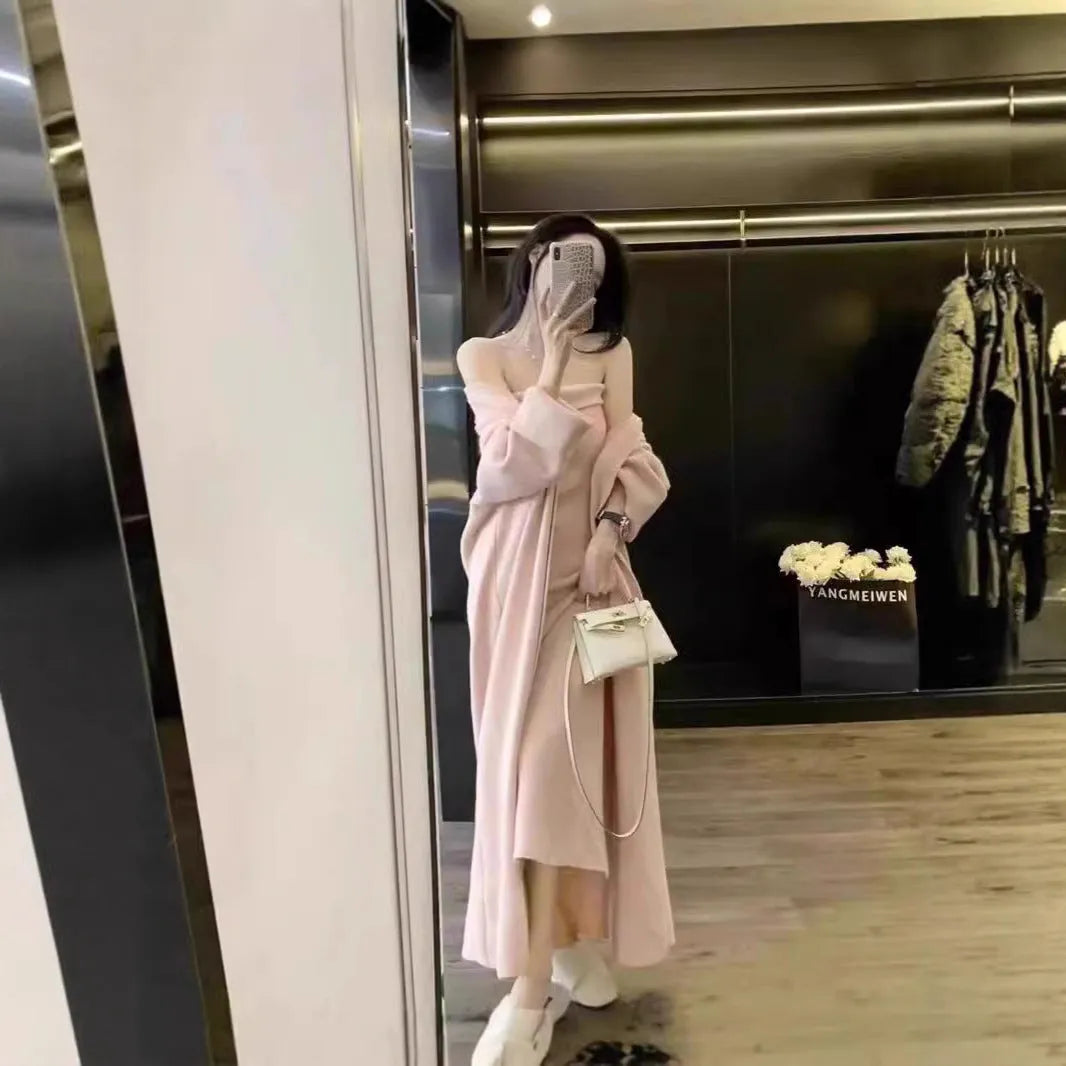 Women's grey knitted long sleeve cardigan and dress co-ord set with flocking detail on a hanger.