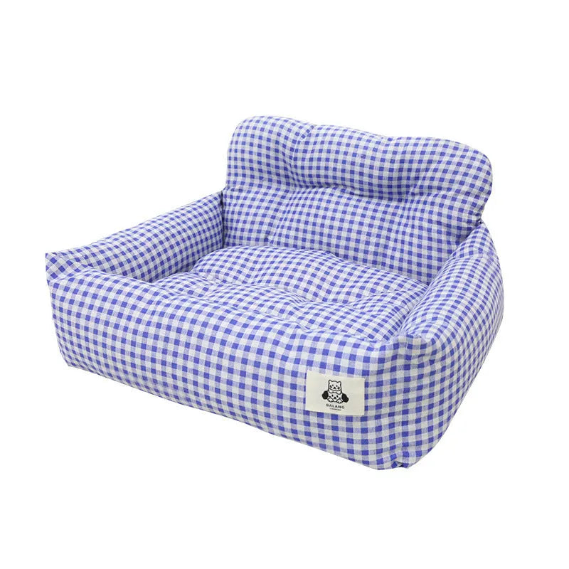 Grey and blue plaid washable fabric dog travel nest for car use, shown in two sizes.