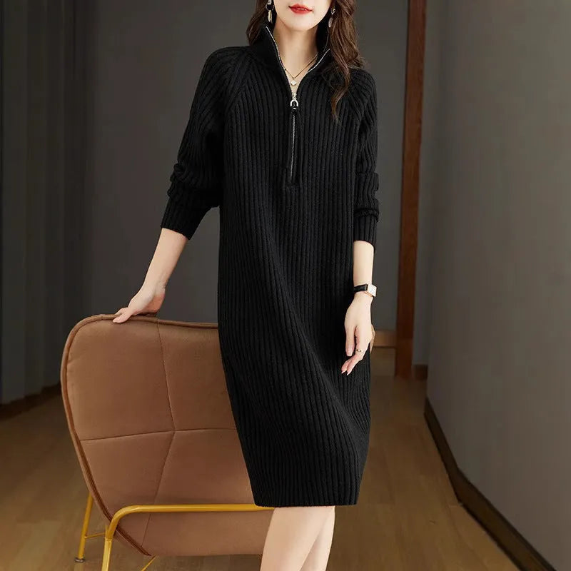 Beige half-zip woollen midi dress with long sleeves and a stand collar, laid flat.