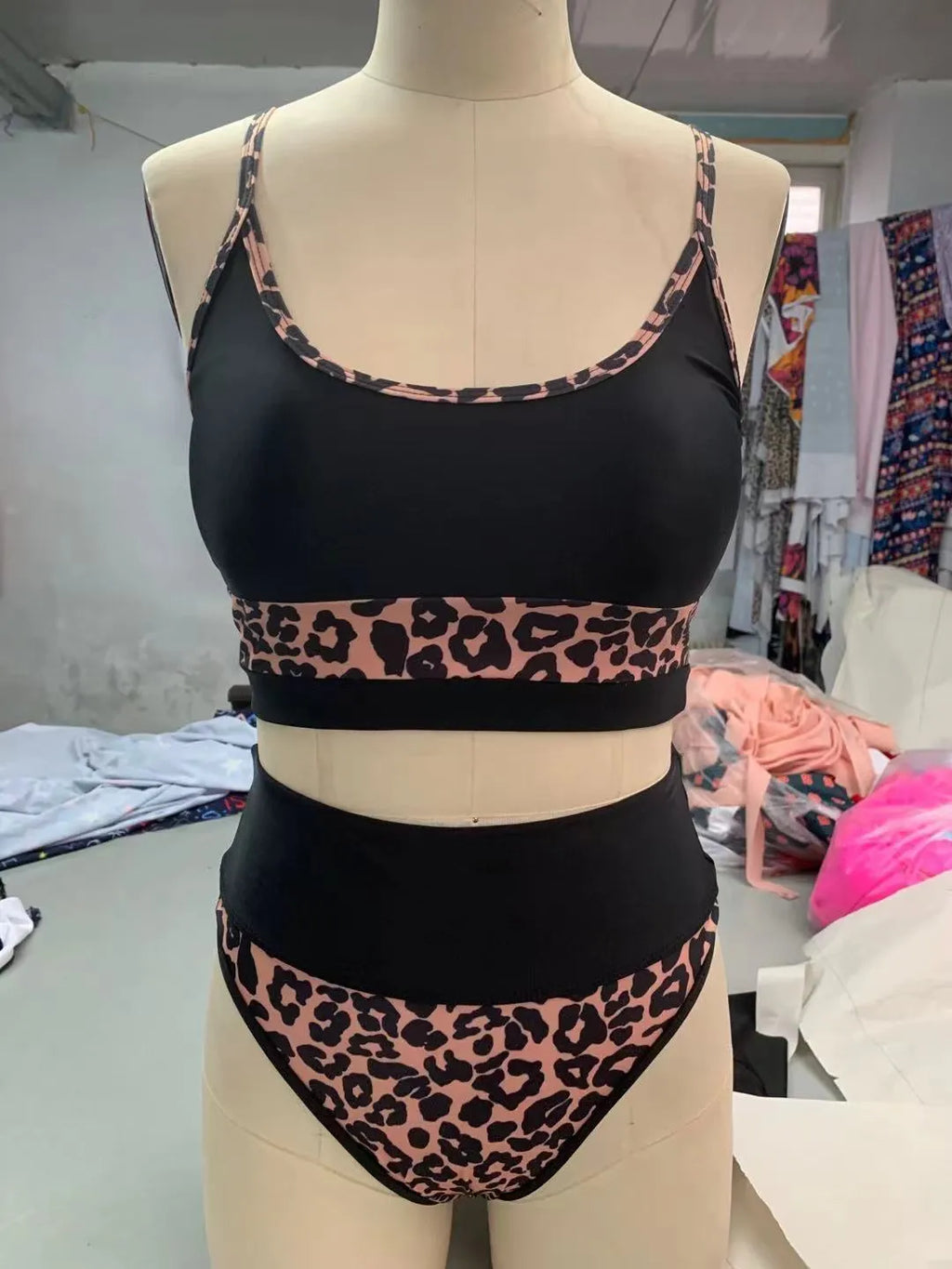 Women's high waist split leg bikini swimsuit in leopard print and white colour options.