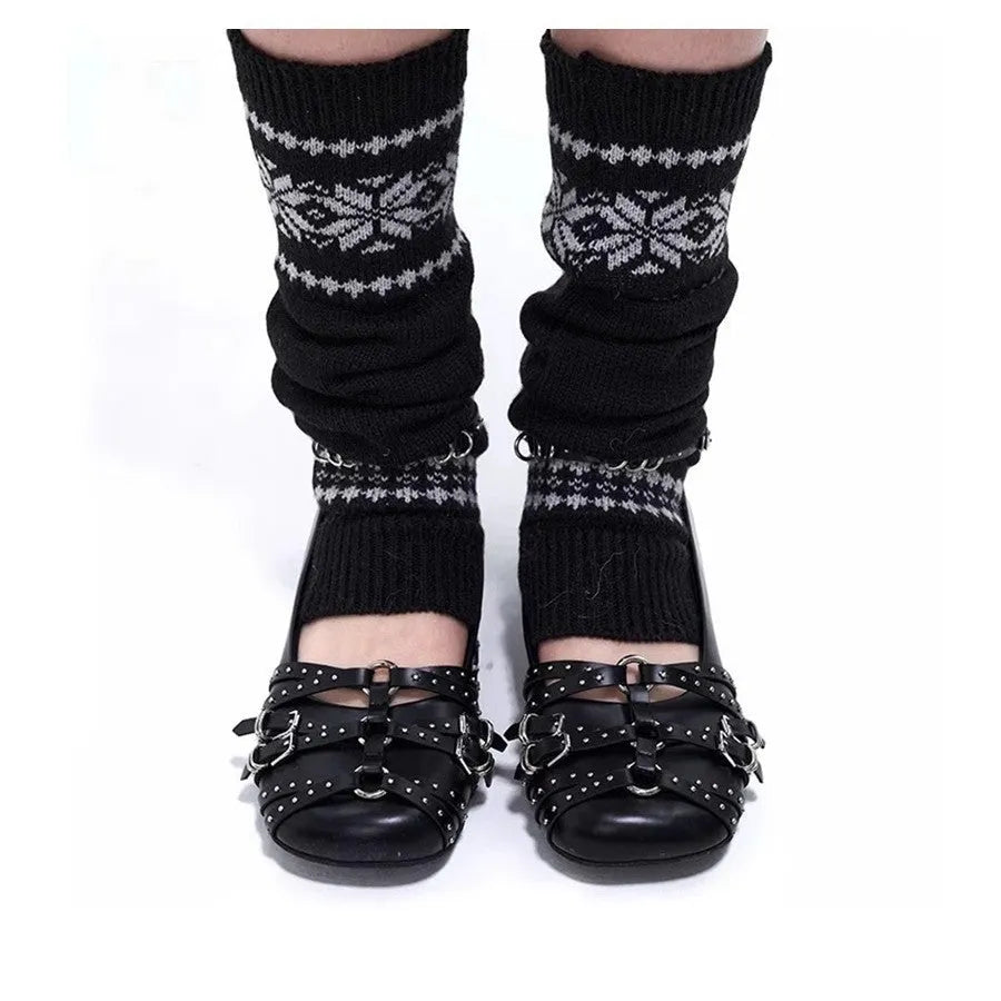 Women's black retro leather pumps with a square toe and silver buckle fastening.