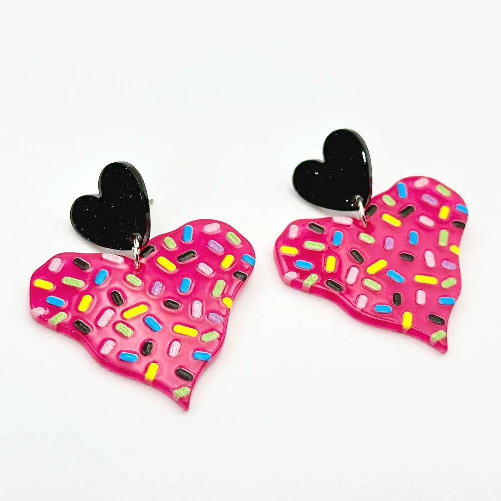 Color printing love heart acrylic earrings in six sweet styles A-F on white background