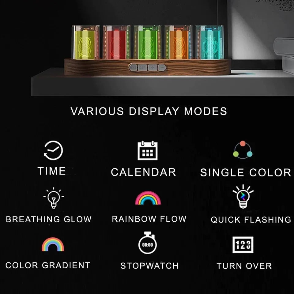 RGB Luminotron LED digital clock showing colourful display on desk with USB cable