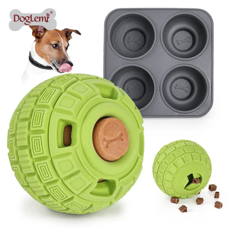 Green natural rubber dropping ball dog toy with hollow centre for treat dispensing