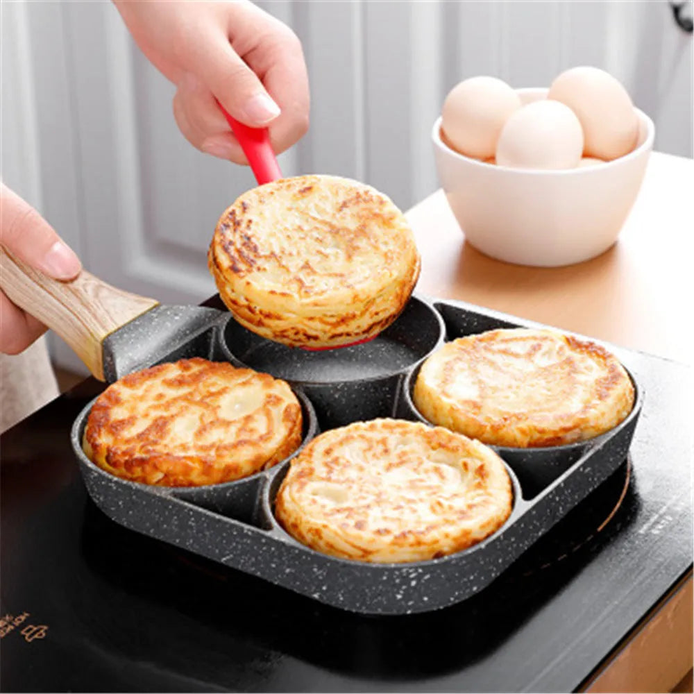 Four-hole non-stick aluminium frying pan with bakelite handle for making breakfast eggs and pancakes