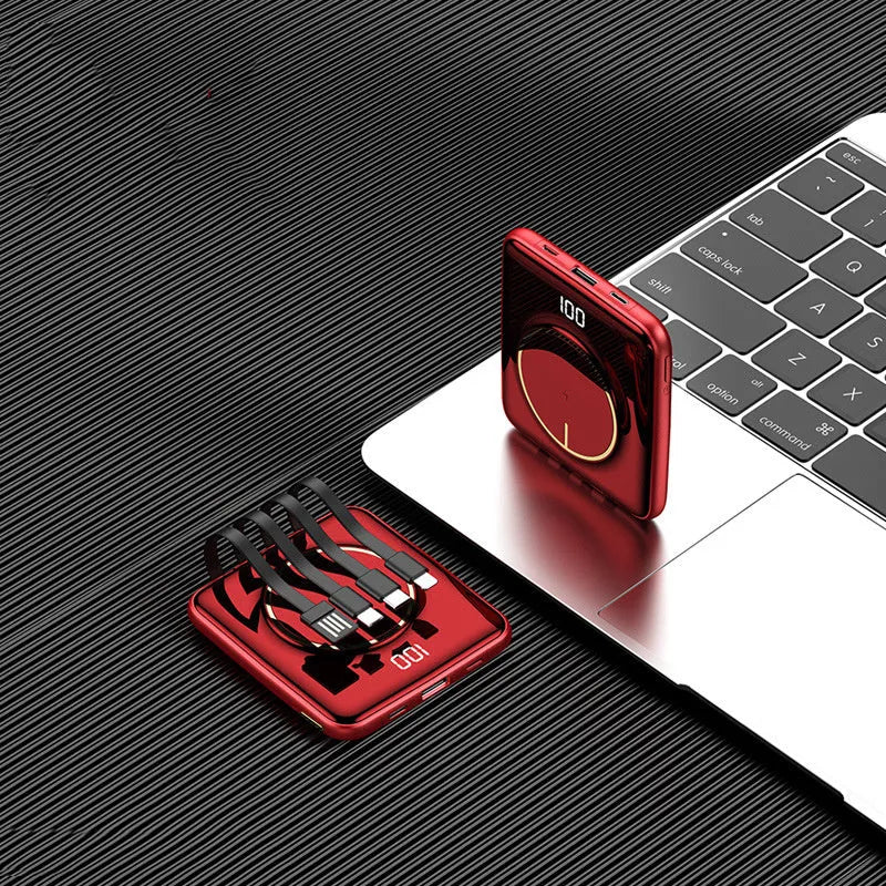 Compact square 20000mAh power bank with LCD screen in black, green, or red colour.