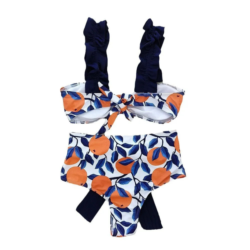 Women's high waisted bikini swimsuit with blue leaf orange floral print on polyester fabric