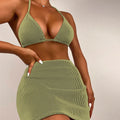 Women's three-piece ribbed bikini swimsuit set in green colour.