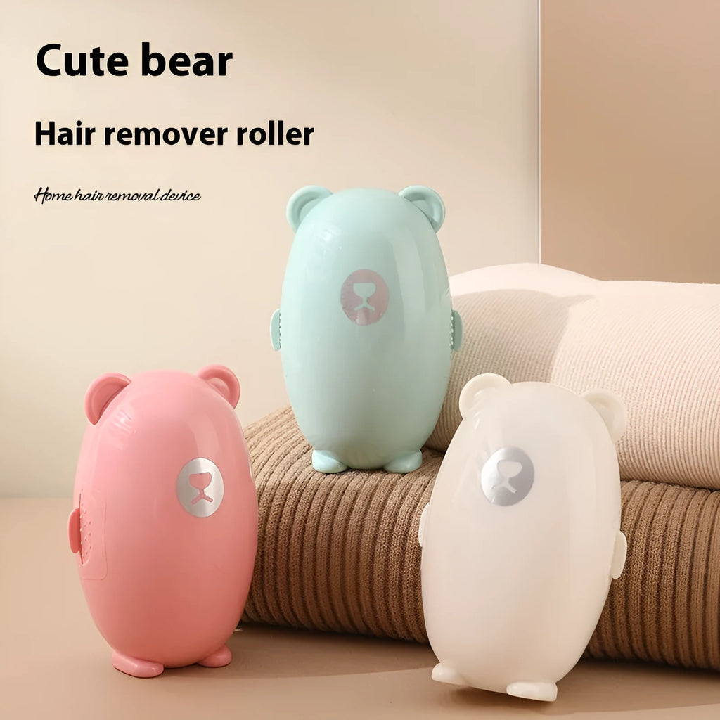 Washable silicone lint removal roller in green, pink, or white colours on fabric surface