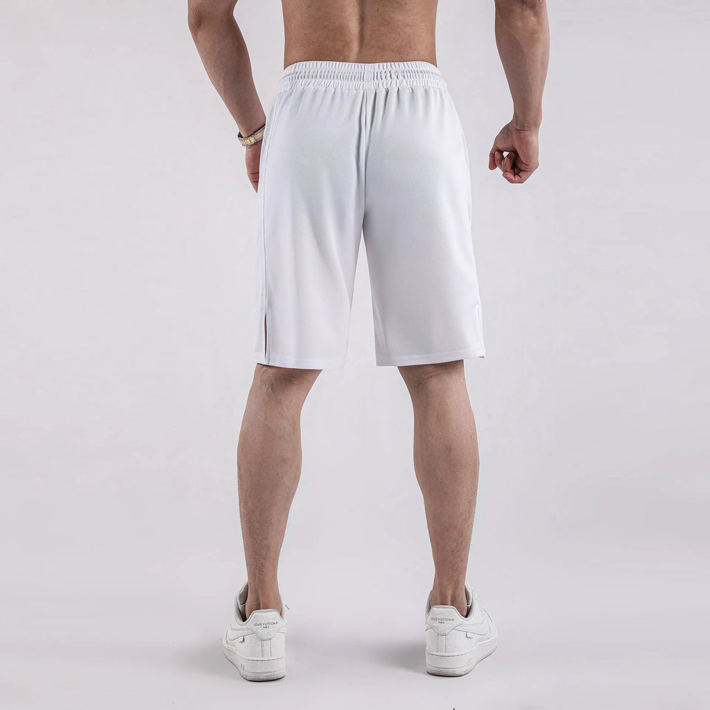 Man wearing black quick-drying mesh fitness shorts with elastic waistband