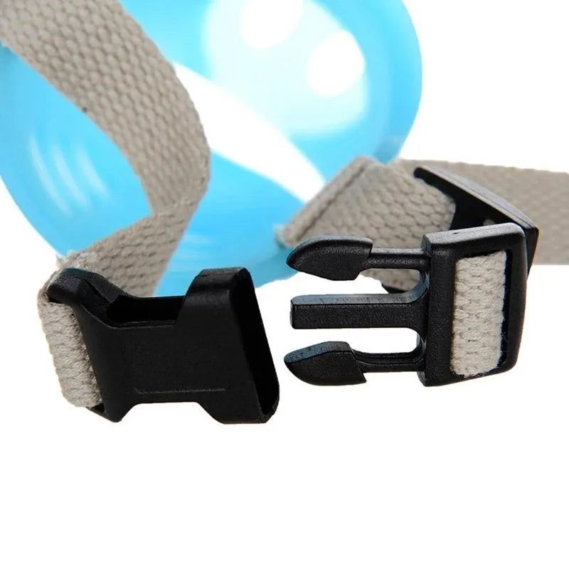 Blue silicone dog anti-bite mouth cover shown on long-mouthed breed with size dimensions displayed