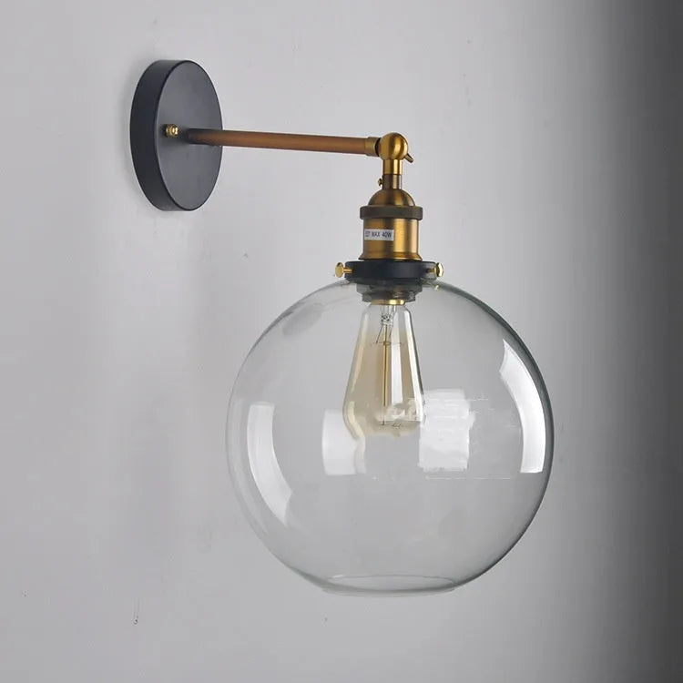 20cm diameter retro spherical glass wall lamp in amber, smoky grey, or transparent with aluminium holder.