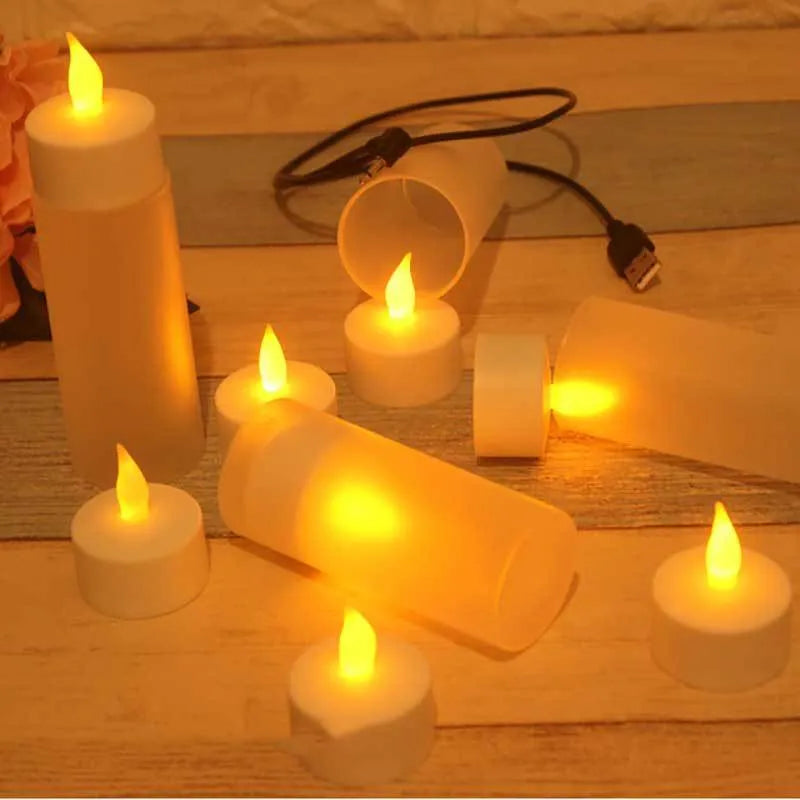 White plastic rechargeable LED candle lamp with yellow glowing flame on a table.