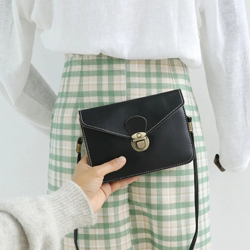 Retro soft surface shoulder messenger bag in cross square shape with flap closure