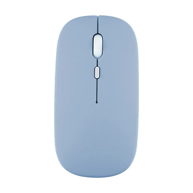 Candy wireless Bluetooth mouse in pink, ergonomic shape, 1200dpi, silent buttons, on a white desk