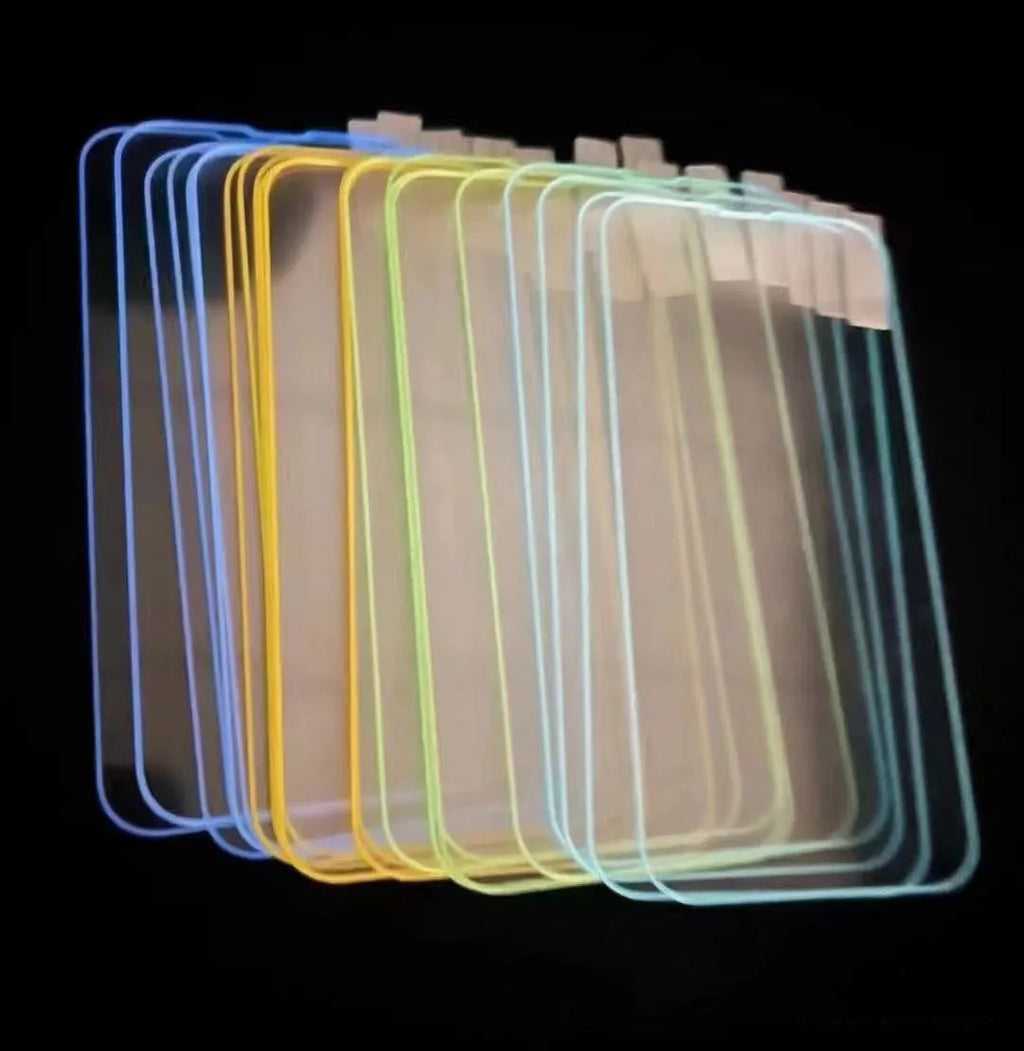 Fluorescent tempered glass screen protector for iPhone with glowing green edge on a phone
