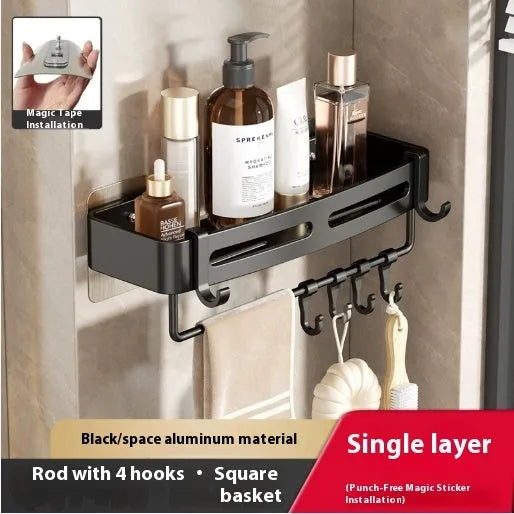 Gun Gray metal corner storage rack mounted on a bathroom wall, holding toiletries.