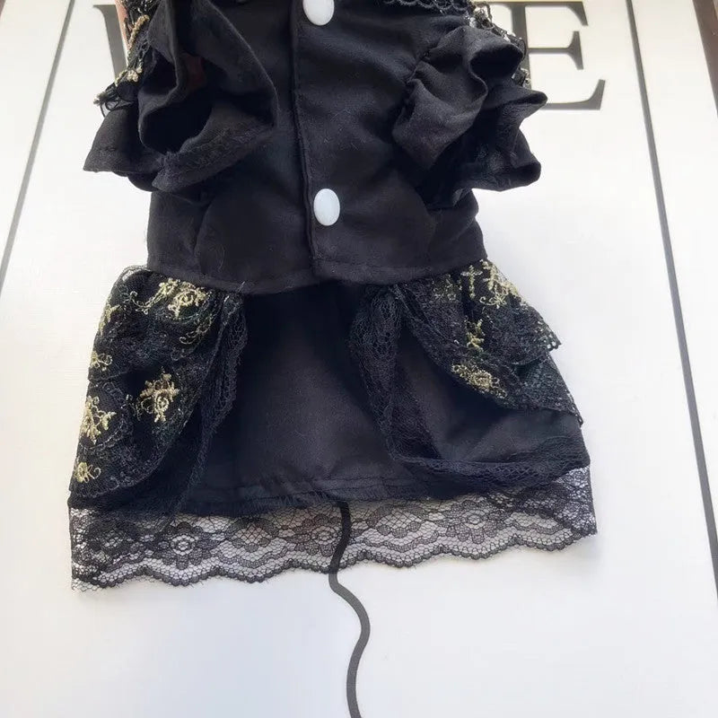 Golden layered gothic-style skirt for a small dog or cat on a mannequin, showing princess cut.