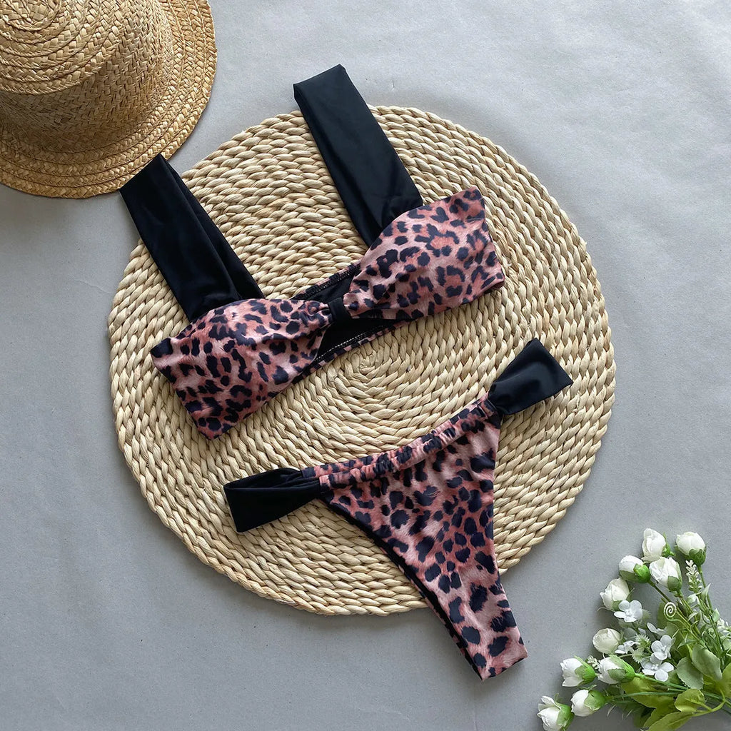 Women's leopard print bikini with tube top and split bottoms in black or leopard pattern