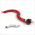 Interactive electric induction snake cat toy with flashing eyes and retractable tongue, USB rechargeable, in snake colour