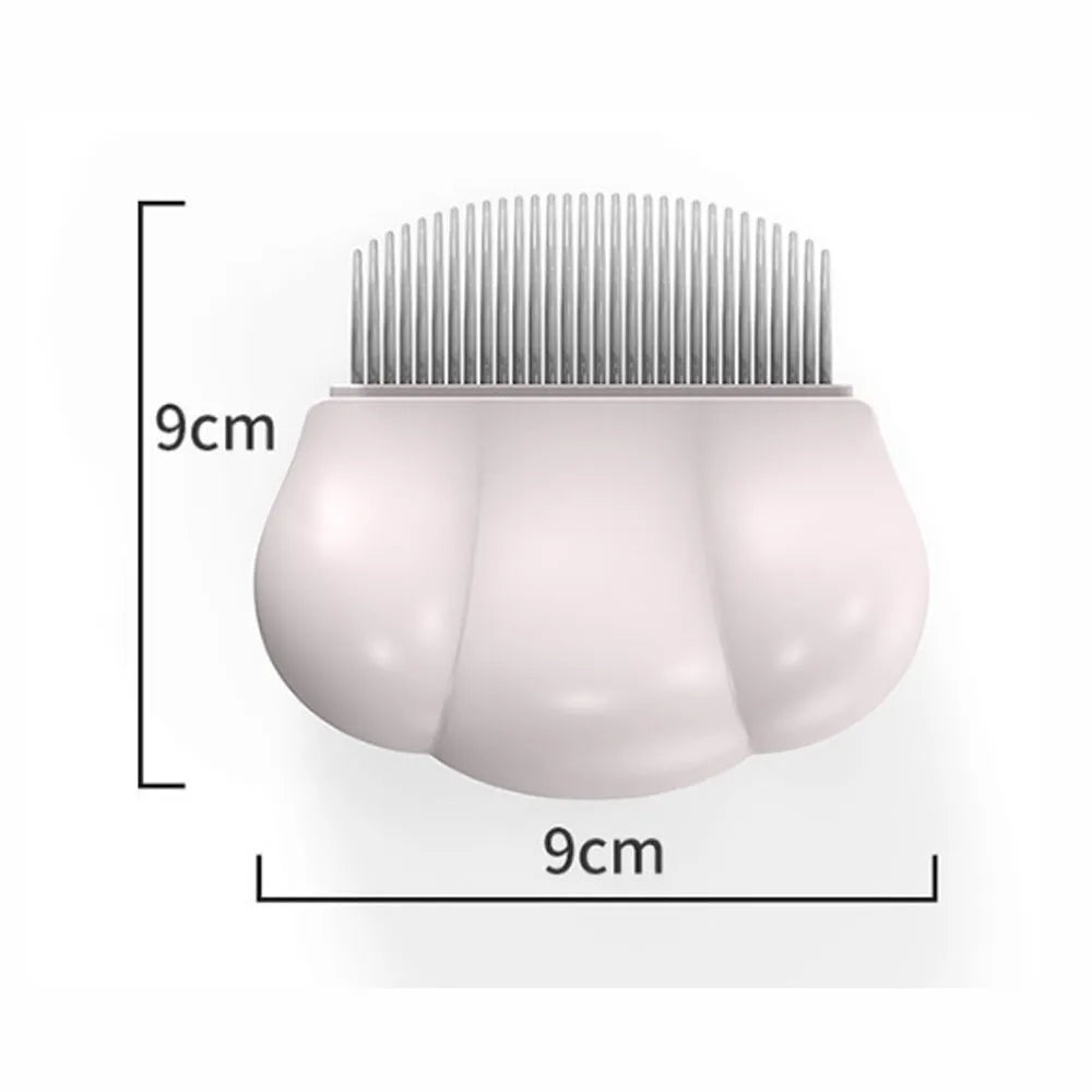 Paw Soft deshedding brush grooming tool for cats and dogs on white background