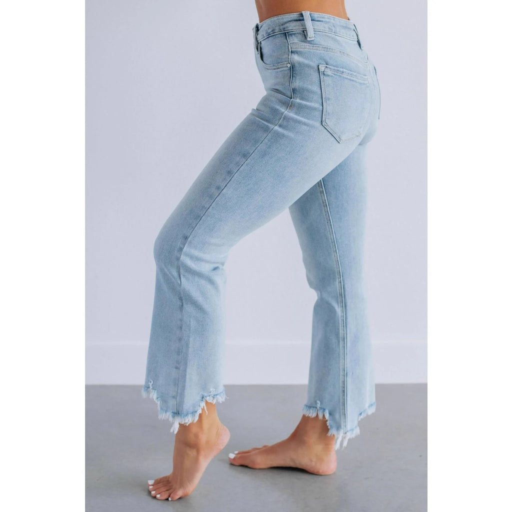 Women's solid colour denim trousers with hand-worn distressing in dark blue and light blue washes