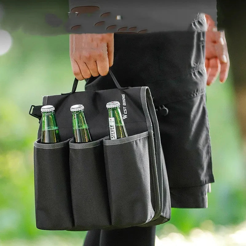 Black bicycle drink cage storage bag mounted on a bottle cage, showing its 2-litre capacity and scratch-resistant side panels.