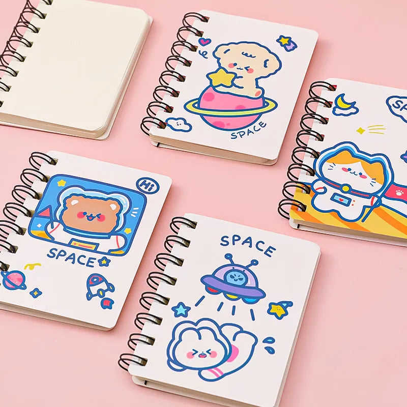 Compact astronaut series flip notebook with space-themed cover, shown closed.