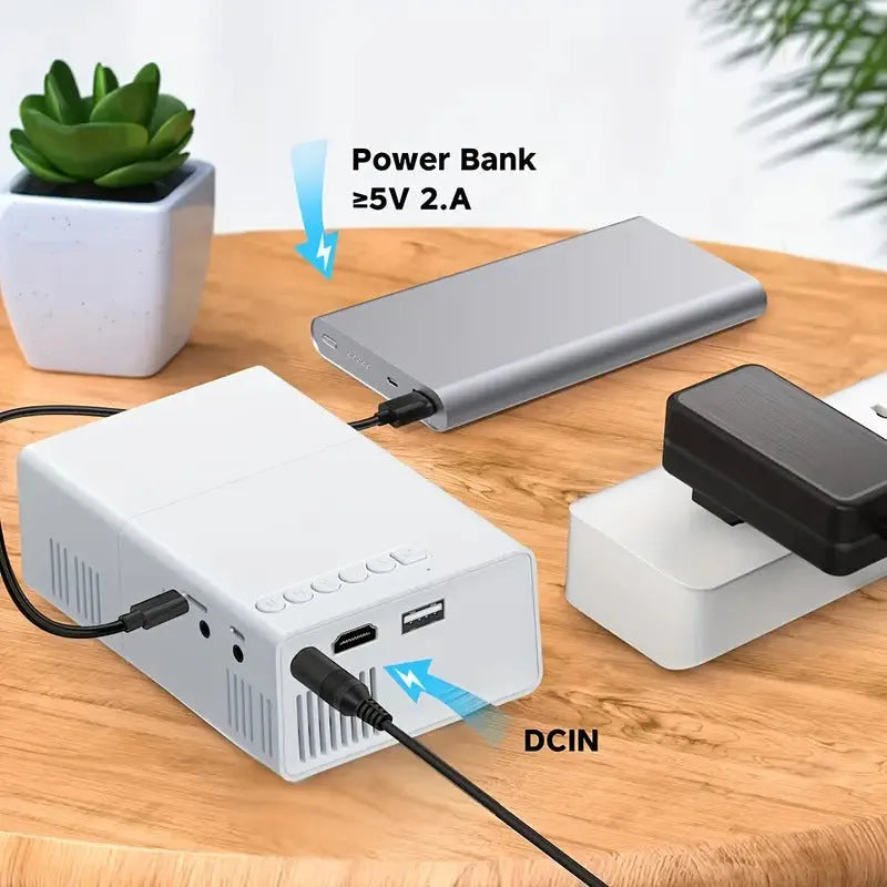 M100 portable mini home projector in black or white colour with remote control.