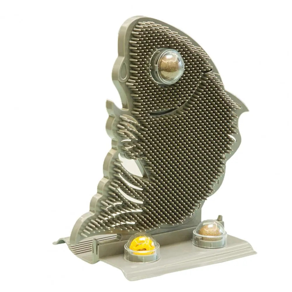 Blue fish-shaped cat wall scratcher toy with brush, catnip balls, and a bell on a white base.