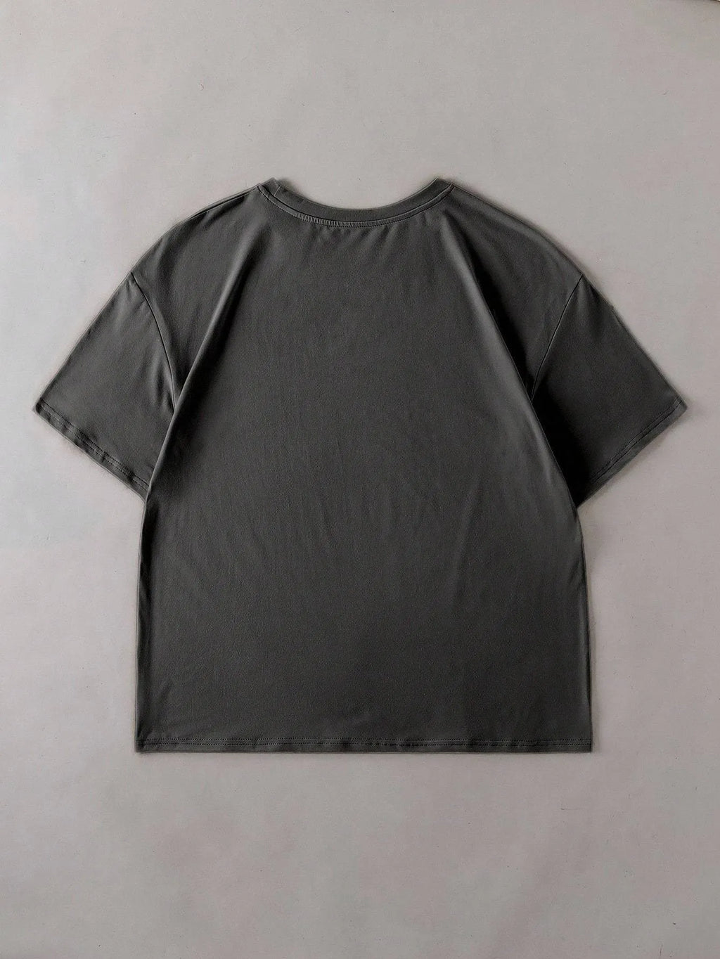 A loose-fit cotton t-shirt with short sleeves and a round neck, shown in various colours.