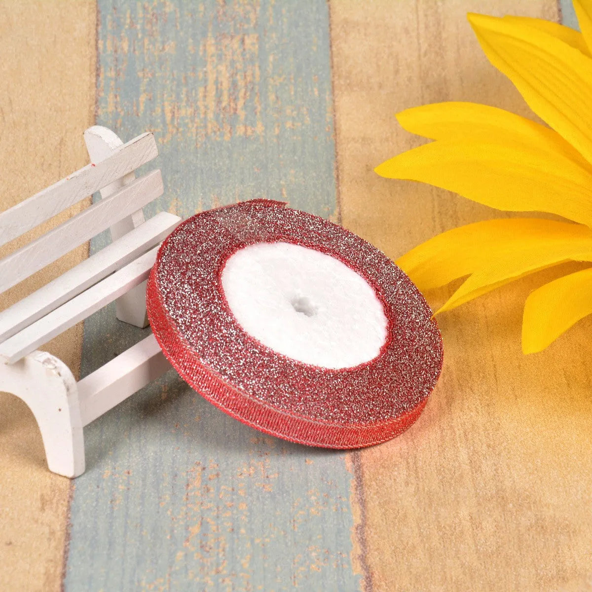 Colourful green onion pattern polyester ribbon spool with metallic gold or silver wire detailing.