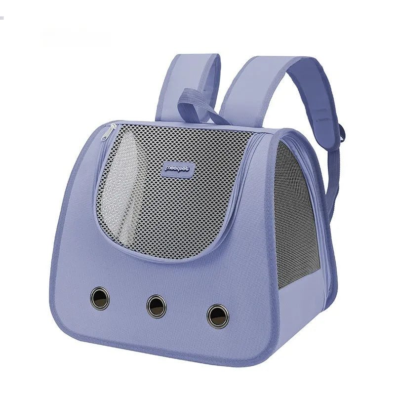 Solid-colour Oxford fabric cat backpack carrier in a medium size on a white background.