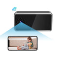 Compact wireless home surveillance camera on a table