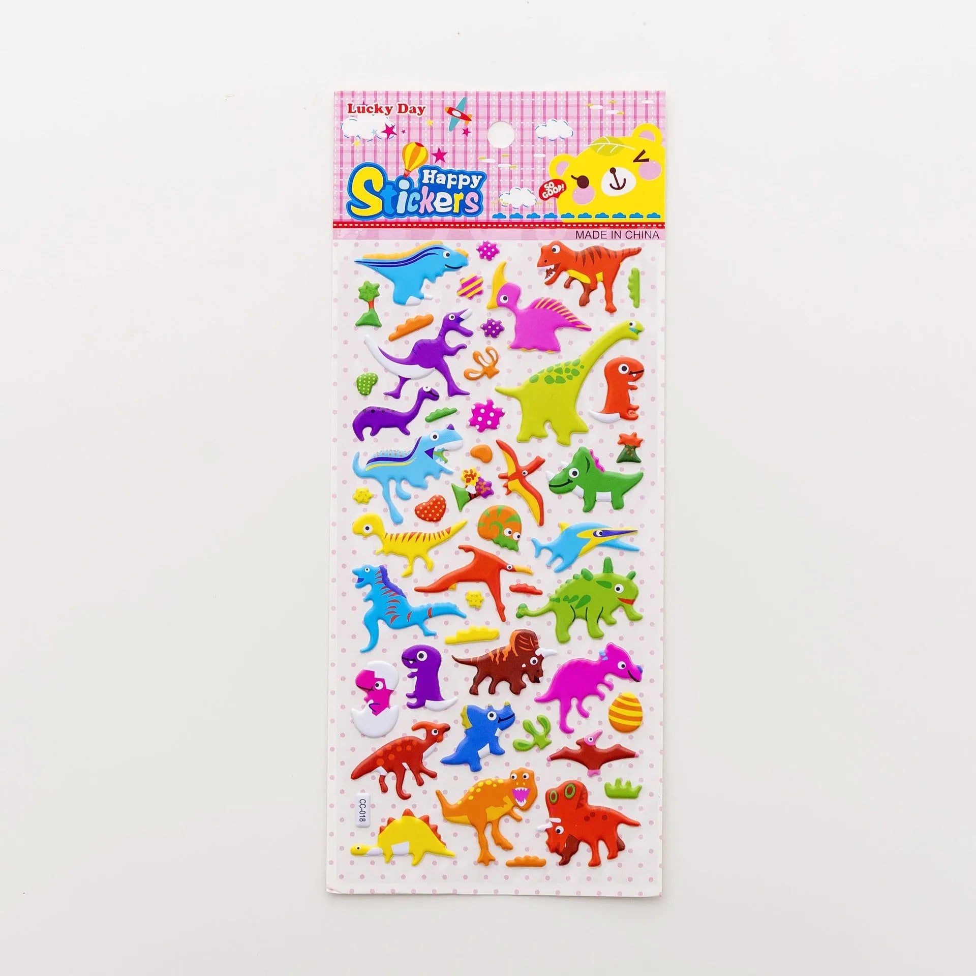Sheet of cartoon-themed three-dimensional bubble stickers with raised surfaces on various designs like an alpaca, dinosaur, and bow tie cat.