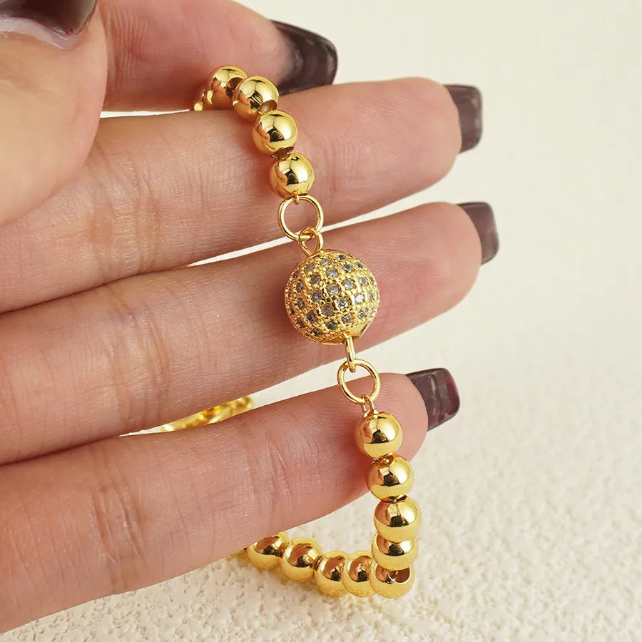 Arabic style heart-shaped copper bracelet for women with a single zircon stone.