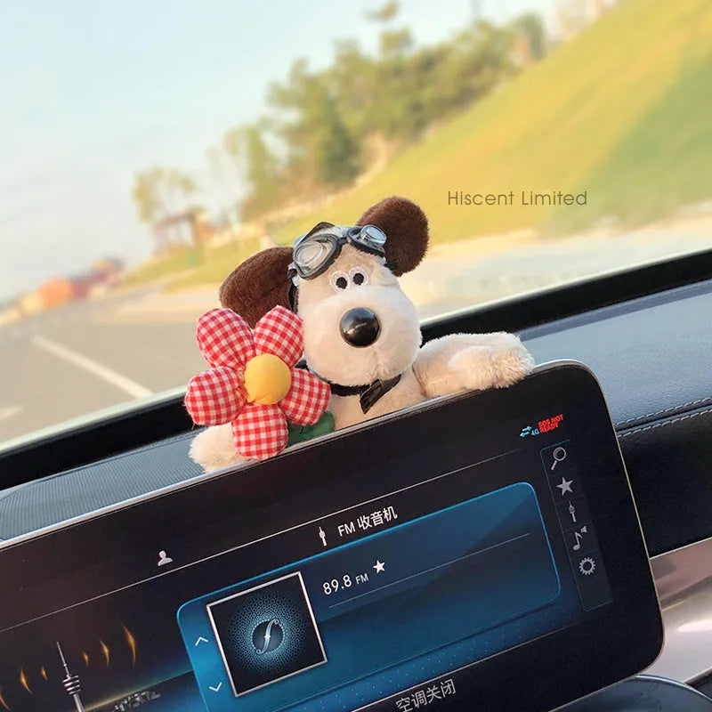 Cute cotton car decoration doll showing a pilot dog design on a dashboard.
