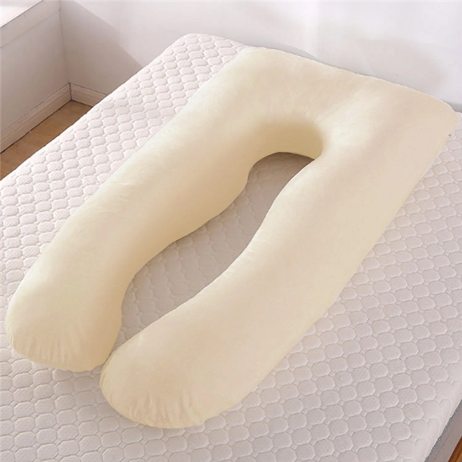 U-shaped maternity pillow with ice silk cover in green colour showing curved design for pregnancy support