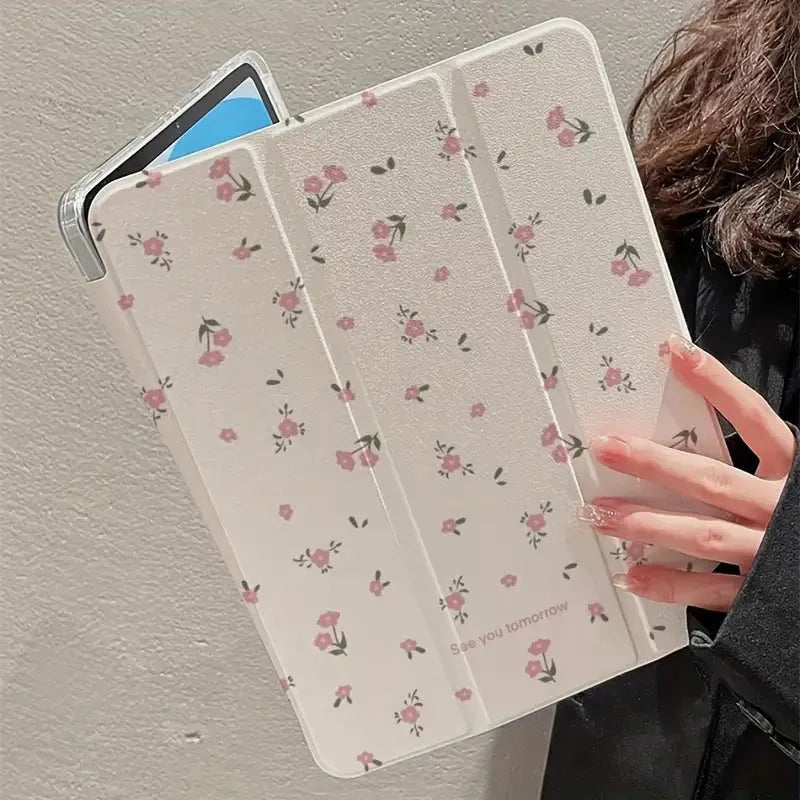 Transparent floral patterned iPad case folded into standing position showing magnetic closure and port cutouts