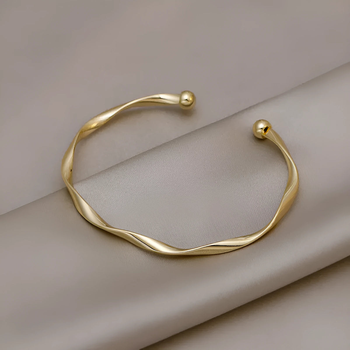 Gold twisted alloy bracelet with geometric Korean style design and 6.2cm inner ring diameter