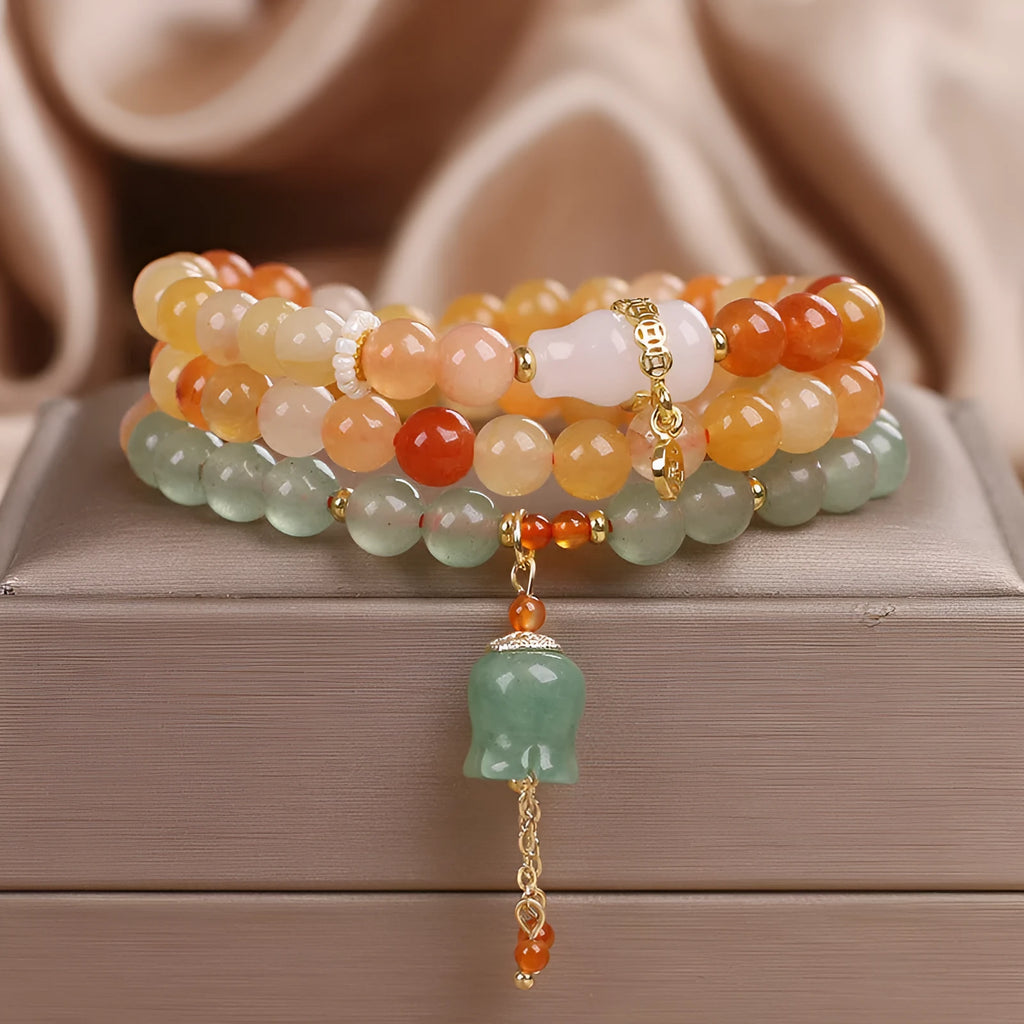Multi-layer Jinsi Jade beaded bracelet with three circles and lily motif, ethnic style women's jewellery