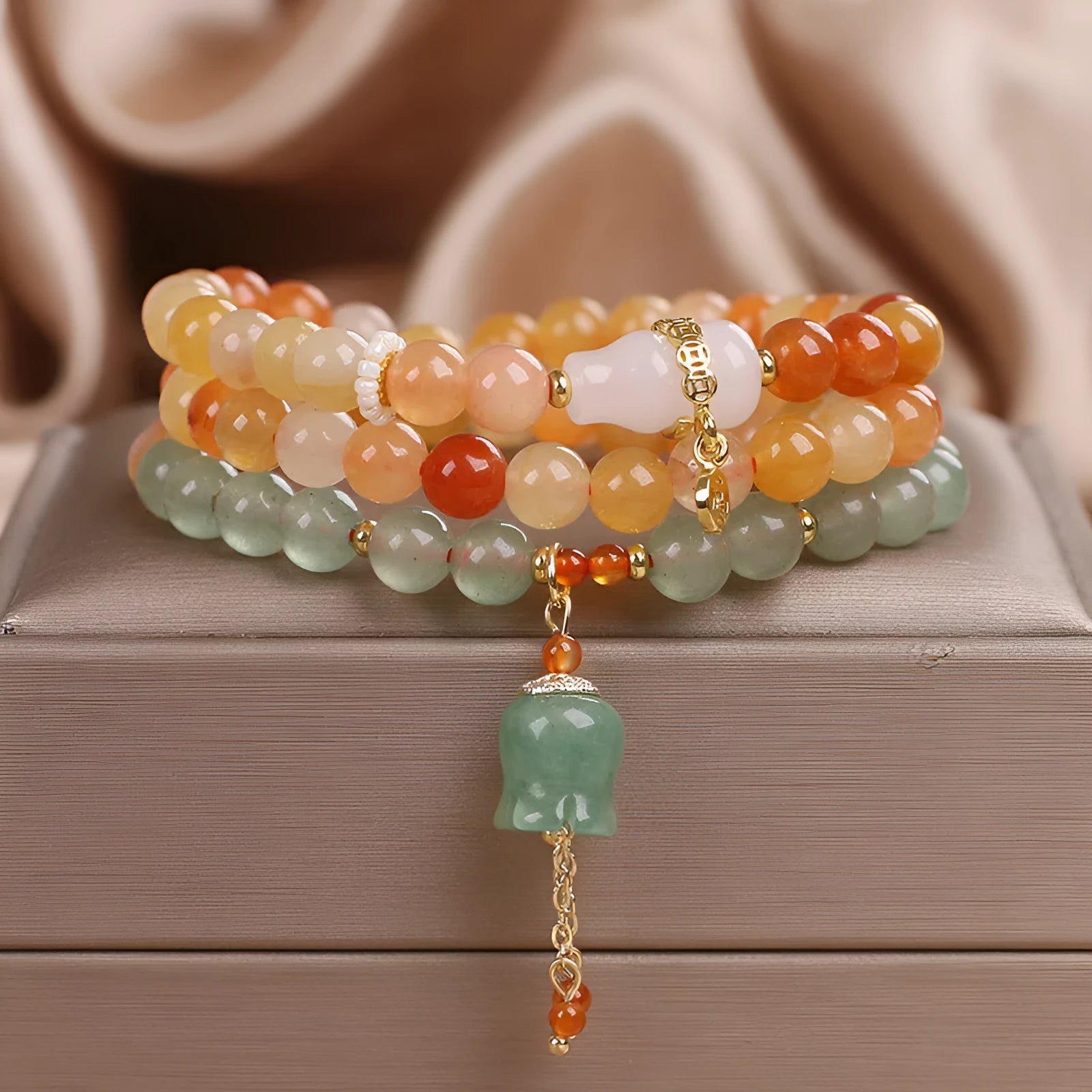 Multi-layer Jinsi Jade beaded bracelet with three circles and lily motif, ethnic style women's jewellery
