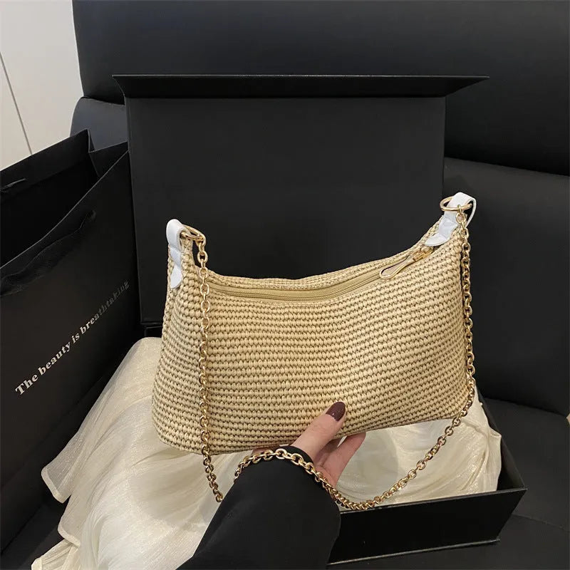 Straw woven beach shoulder tote bag in black colour with polyester lining and sandwich pockets